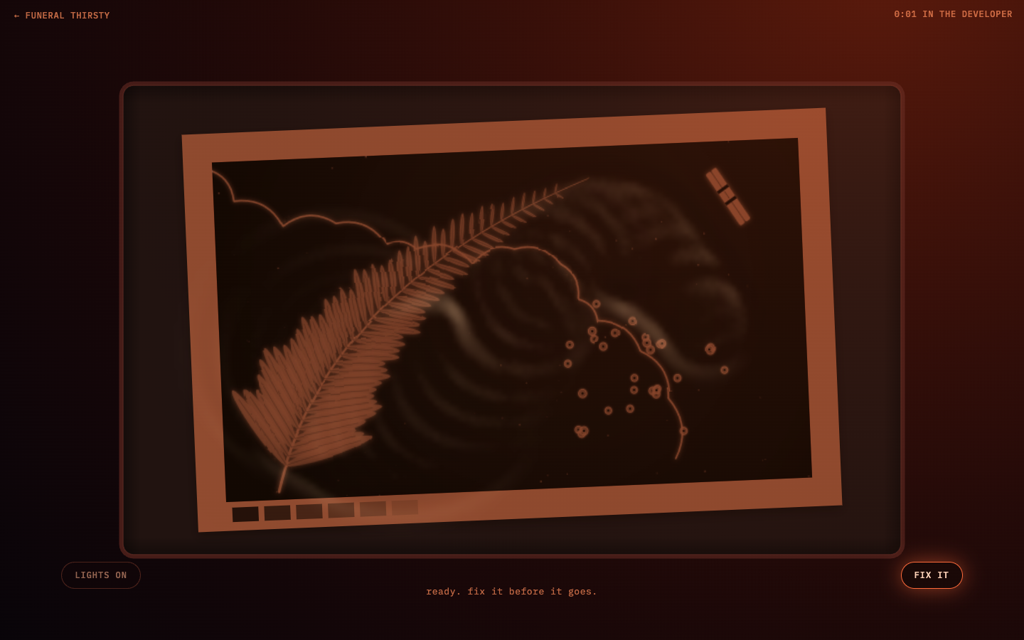 Darkroom: a photogram developing in a tray under a red safelight, a fern and string emerging on the paper